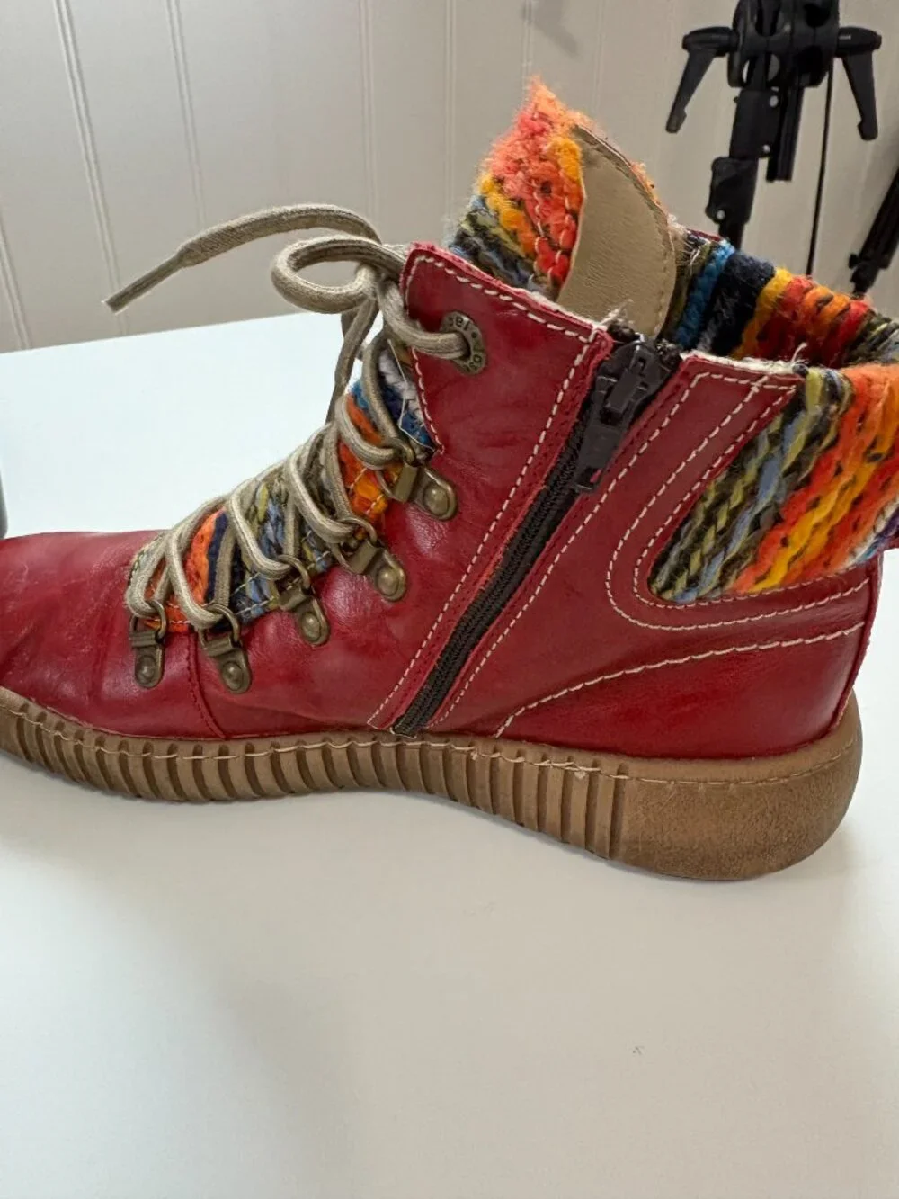 Josef Seibel Maren 06 leather ankle goots in red finish and colorful knit cuff.
